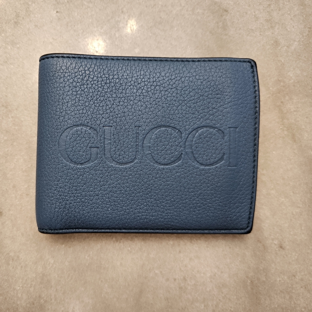 SOLD Gucci Blue Leather Embossed Bifold Wallet